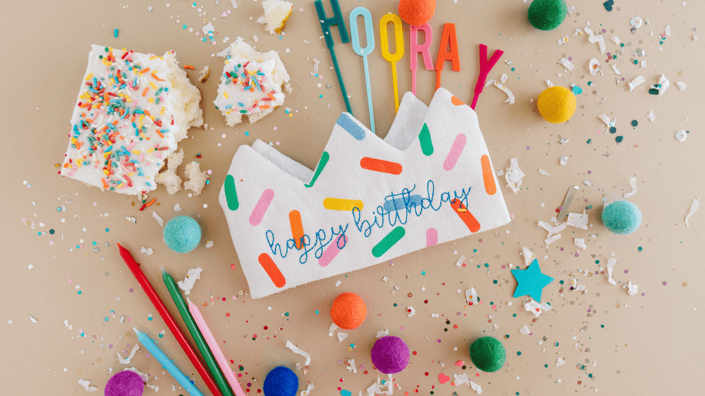 happy birthday crown for kids and adults in a flatlay
