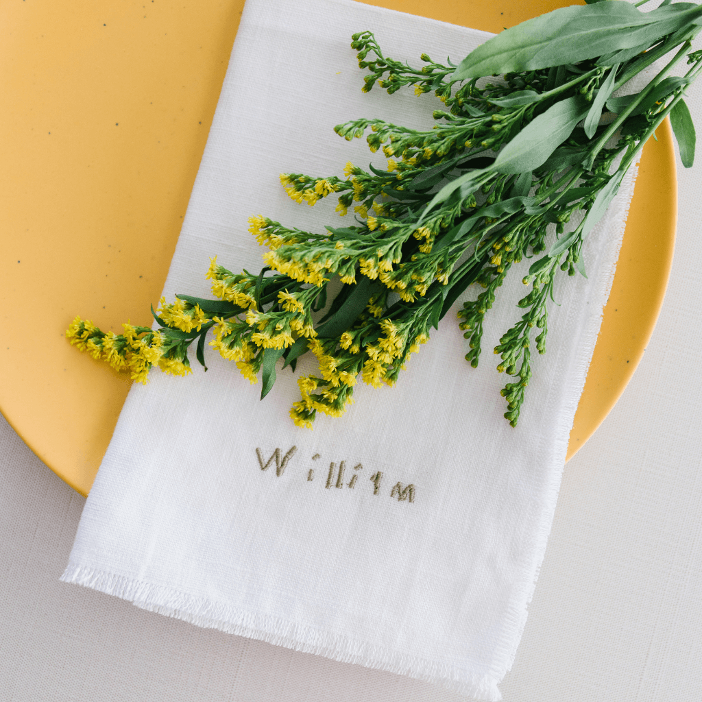 traditional easter decor featuring personalized linen dinner napkins with actual handwriting embroidery