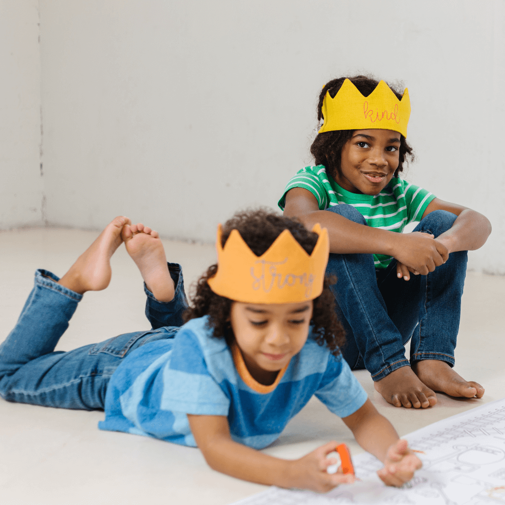 Boys wearing crowns for play and birthday parties.
