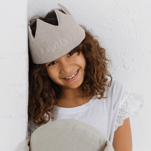 girl wearing a natural linen personalized crown