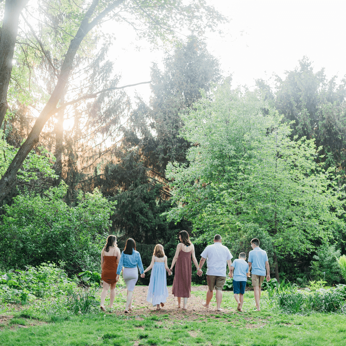 FAMILY OF 7 WALKING IN THE WOODS