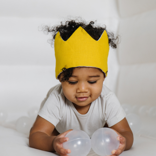 little boy wearing unique crown for birthday